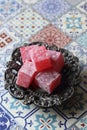 Turkish delight on a traditional tile background