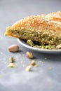 Turkish dessert baklava with pistachios on grey background. Top view. Copy space. Set of assorted traditional eastern Royalty Free Stock Photo