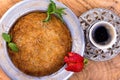 Turkish Dessert Kunefe on a Olive Tree Trunk