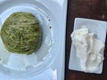 Turkish Dessert Pistachio Roll with Ice Cream served at Restaurant / Fistikli Dolama or Sarma Baklava / Baklawa. Royalty Free Stock Photo