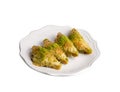 Turkish Dessert Sobiyet Baklava. Turkish pistachio baklava on a white background Royalty Free Stock Photo