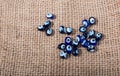 Turkish evil eye beads on canvas texture Royalty Free Stock Photo