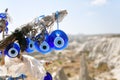 The Turkish evil eyes hang off the bare leaf trees from Esentepe viewpoint, Turkey