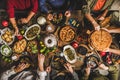 Turkish family celebrating at table with traditional foods and raki Royalty Free Stock Photo