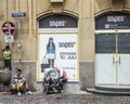 turkish family rests at the entrance of an old house in Freiburg