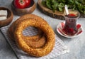 Turkish fast food bagel called Simit. Turkish bagel Simit with sesame. Bagel is traditional Turkish bakery food. Turkish name