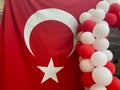 Turkish flag and balloons, turkey day decorations in a restaurant cafe bar catering establishment for a holiday in a hotel in a Royalty Free Stock Photo