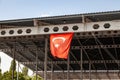 Turkish flag or flag of Turkey waving on building against blue sky in Istanbul. Space for text Royalty Free Stock Photo