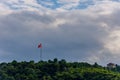 The turkish flag flagging above the trees Royalty Free Stock Photo