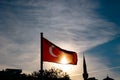 Turkish Flag and Minaret of a mosque on the background. Royalty Free Stock Photo