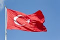 Turkish flag - Moon and star icon on red background against blue sky