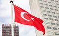 Turkish flag waving against cloudy sky background Royalty Free Stock Photo