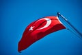 Turkish flag waving in blue sky, Istanbul, TURKEY Royalty Free Stock Photo