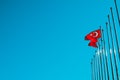 Turkish flag waving at a blue sky Royalty Free Stock Photo