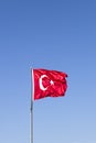 Turkish flag waving in the wind at blue sky Royalty Free Stock Photo