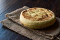 Turkish Flat Bread Bazlama on wooden surface Royalty Free Stock Photo