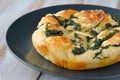 Turkish flat bread with cheese and spinach topping Royalty Free Stock Photo