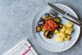 Turkish Food Kizartma / Fried Aubergine or Eggplant Slices with Tomato Paste Salsa Sauce and Cube Potatoes. Royalty Free Stock Photo