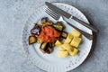 Turkish Food Kizartma / Fried Aubergine or Eggplant Slices with Tomato Paste Salsa Sauce and Cube Potatoes. Royalty Free Stock Photo