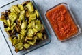 Turkish Food Kizartma / Fried Aubergine or Eggplant Slices with Tomato Paste Salsa Sauce in Glass Bowl. Royalty Free Stock Photo