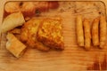 Turkish fried sigara borek on wood.