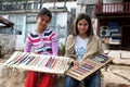 Turkish girls with a colourful display of jewellery at Kalekoy in Turkey.