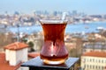 Turkish glass with tea on background of cityscape of Istanbul Royalty Free Stock Photo