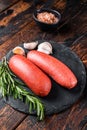 Turkish halal Sucuk meat sausage. Wooden background. Top view Royalty Free Stock Photo