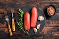 Turkish halal Sucuk meat sausage. Wooden background. Top view Royalty Free Stock Photo