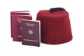Turkish hat (fez) and german travel passports