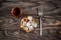 Turkish joys with different nuts is a glass of tea and a spoon. Eastern sweets. Traditional Turkish delight Rahat lokum on a Royalty Free Stock Photo