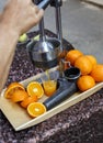 Turkish man sell orange juice in street of istanbul with old met Royalty Free Stock Photo
