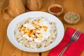 Turkish Manti (ravioli) on plate with red pepper, butter, sauce, yogurt and mint Royalty Free Stock Photo