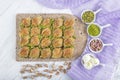 Turkish Midye Baklava Mussel Shape Baklava with green pistachio Powder and Butter Cream. Famous Turkish Gaziantep baklava