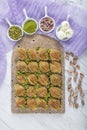 Turkish Midye Baklava Mussel Shape Baklava with green pistachio Powder and Butter Cream. Famous Turkish Gaziantep baklava