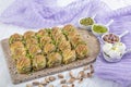 Turkish Midye Baklava Mussel Shape Baklava with green pistachio Powder and Butter Cream. Famous Turkish Gaziantep baklava