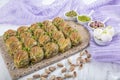 Turkish Midye Baklava Mussel Shape Baklava with green pistachio Powder and Butter Cream. Famous Turkish Gaziantep baklava