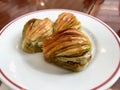 Turkish Midye Baklava Mussel Shape Baklawa with Green Pistachio Powder and Butter Cream