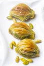 Turkish Midye Baklava ( Mussel Shape Baklava ) with green pistachio