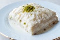 Turkish Milk Dessert Sutlava made with Gullac and Dairy Baklava Dough. Royalty Free Stock Photo