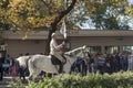 Turkish mounted troops holding flag in old style military uniform