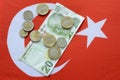 Turkish national currency lira on turkish flag Royalty Free Stock Photo