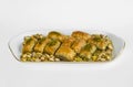 Turkish Pastry Dessert Pistachio Baklava in long plate