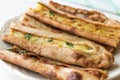 Turkish Pastry Konya Mevlana Pide with Cubed Meat and Melted Cheese.