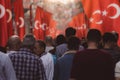 Turkish people with Turkish flags. National holidays of Turkiye concept