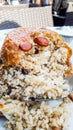 Turkish Perde Pilavi / Drape pilaf with chicken, almond and raisin.