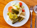 Turkish pickles made with cucumber, cabbage and carrots closeup