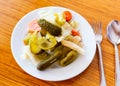 Turkish pickles made with cucumber, cabbage and carrots closeup