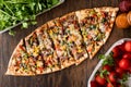 Turkish Pide with meat and vegetables. Royalty Free Stock Photo