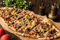 Turkish Pide with meat and vegetables. Royalty Free Stock Photo